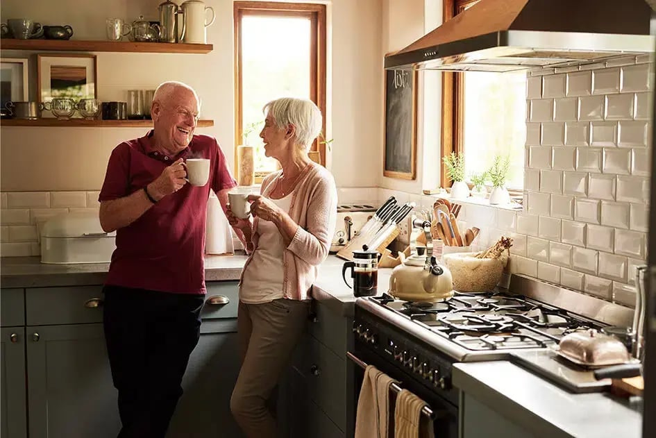 Older Couple enjoying a Remodeled Kitchen