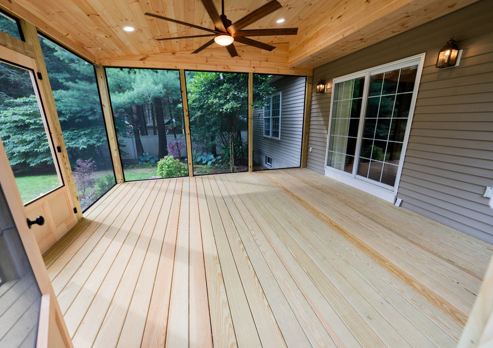 From Exterior Door 1, Full Interior Deck to Screened-in Porch "After" | Blackdog Home Services