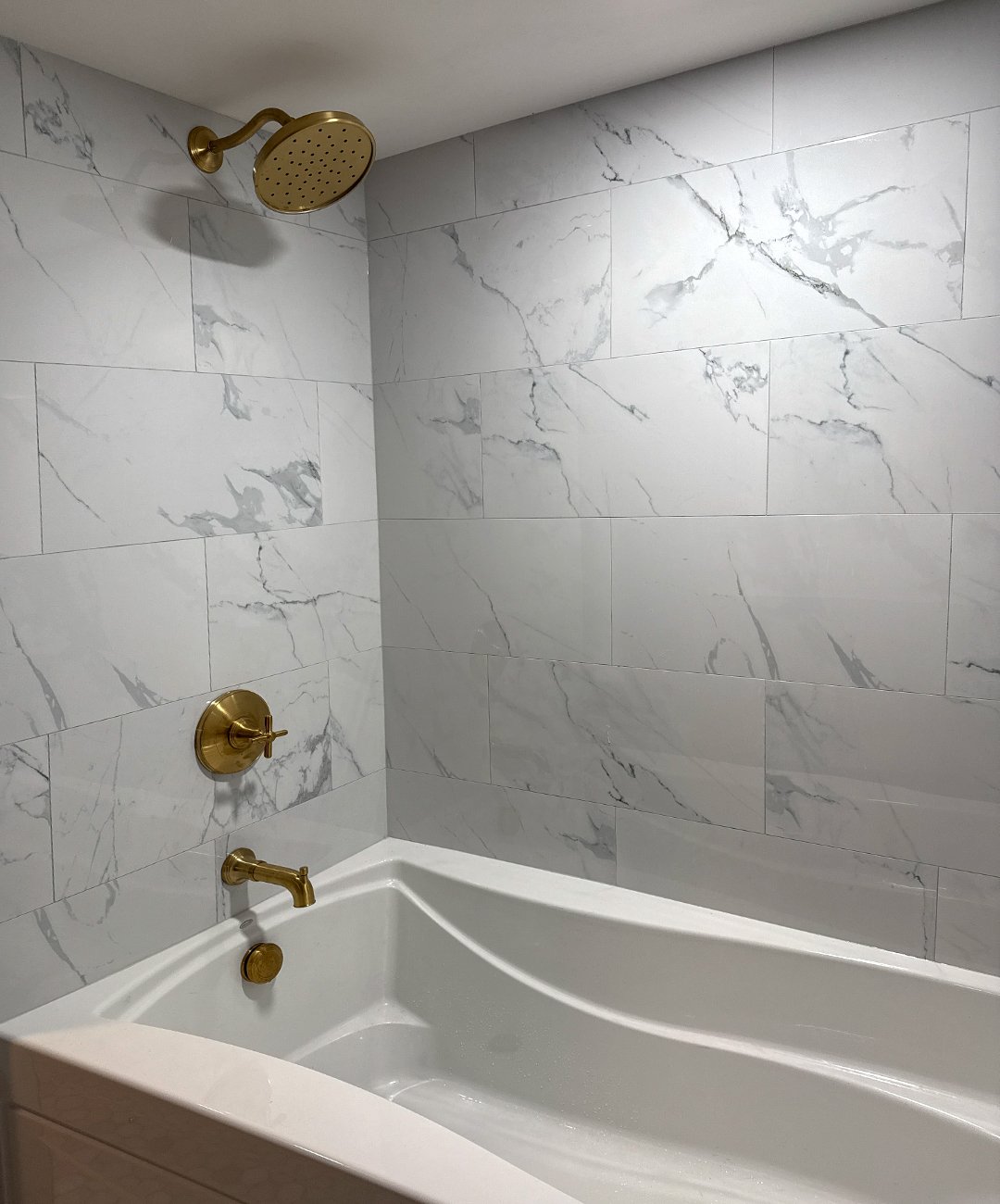 Guest Suite Bathroom with Brass Hardware, Custom Tiling & Soaking Tub - TBF