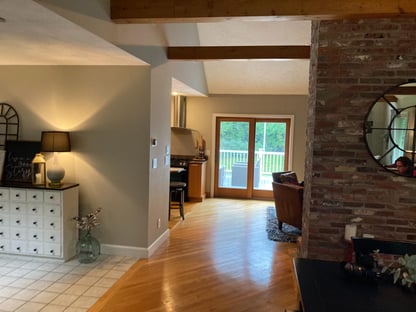 A view from an entryway in an Andover, MA home looking toward the kitchen before a remodel was completed by Blackdog Design/Build/Remodel
