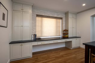 A classic transitional design serving as an extension of a kitchen remodel in Andover, MA by Blackdog Design/Build/Remodel featuring additional cabinets and space for serving.