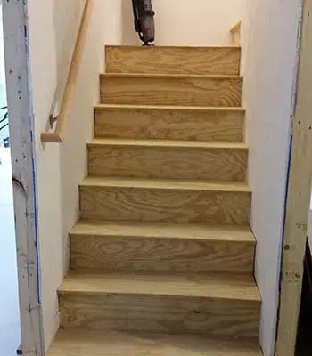 Unfinished wooden staircase