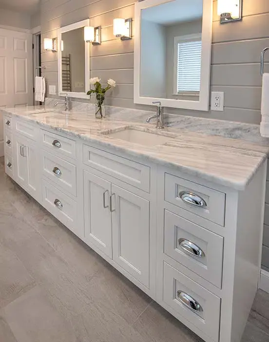 Bathroom with black granite countertop and toilet