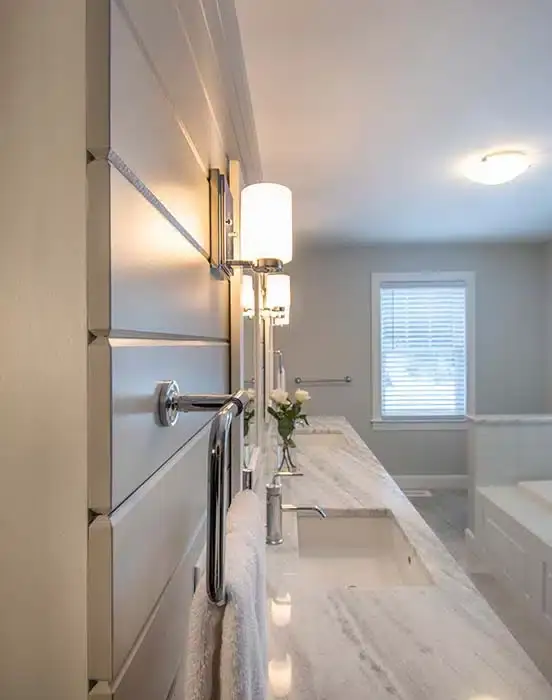 Bathroom with black granite countertop and toilet